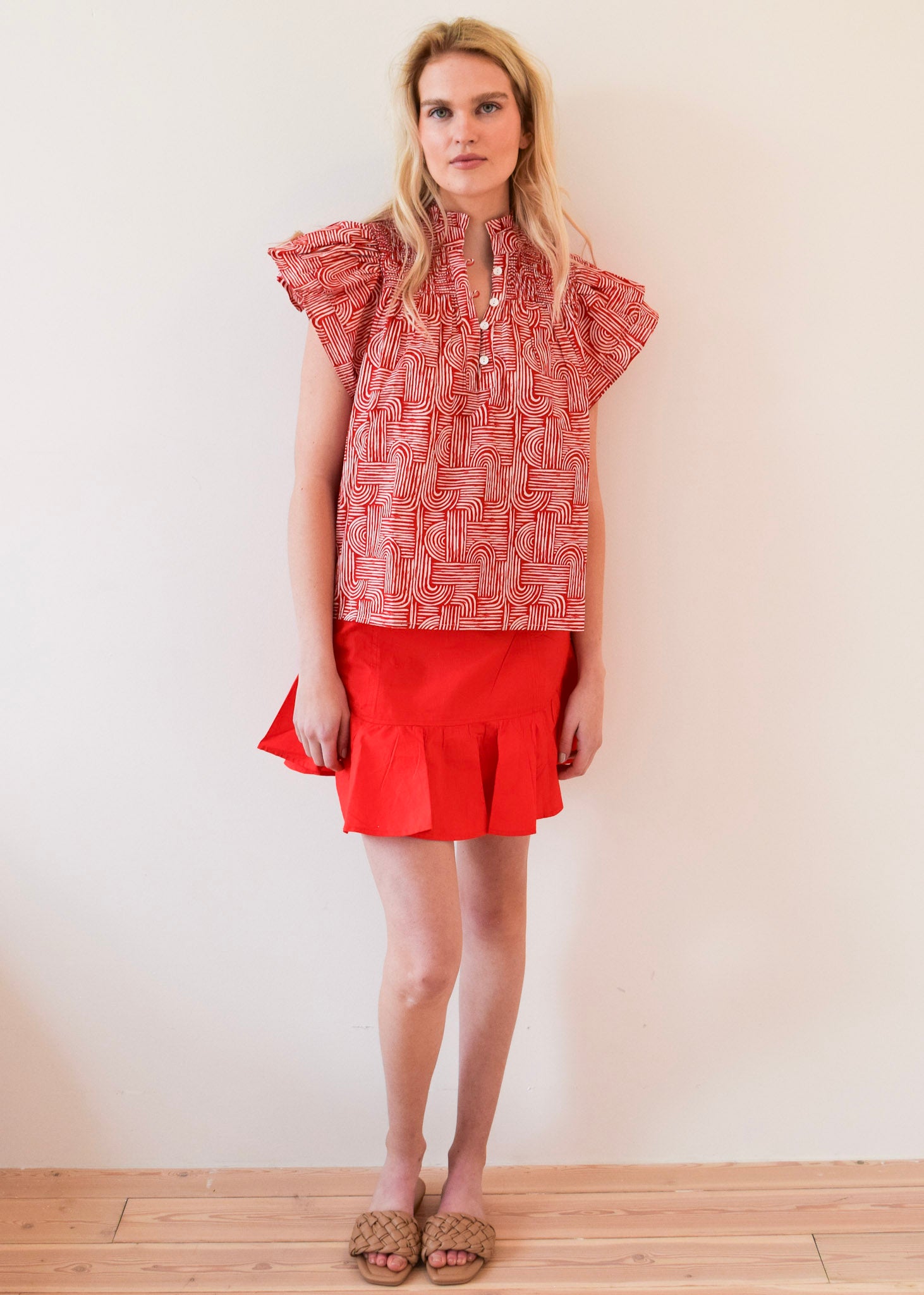 red smocked top